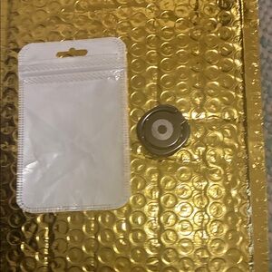 Gold Metallic Bubble Mailer with Silver Grommet Accessory